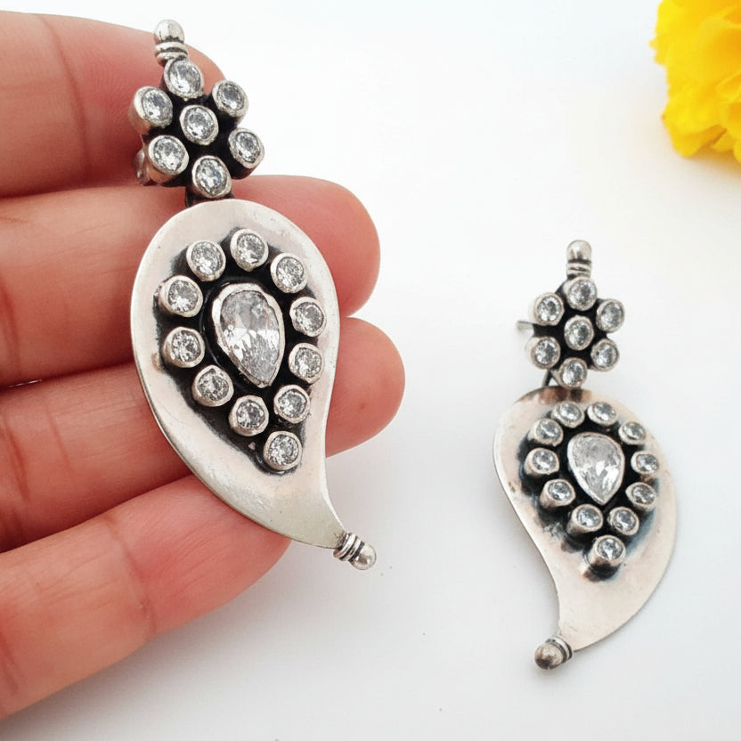 Silver Mango Motif Cutstone White Earring