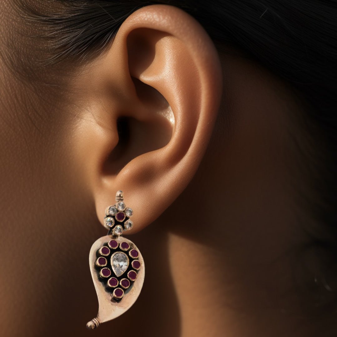 Silver Cutstone Ruby encircled White Earring