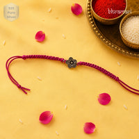 Bandhan Floral Rakhi in Maroon Thread