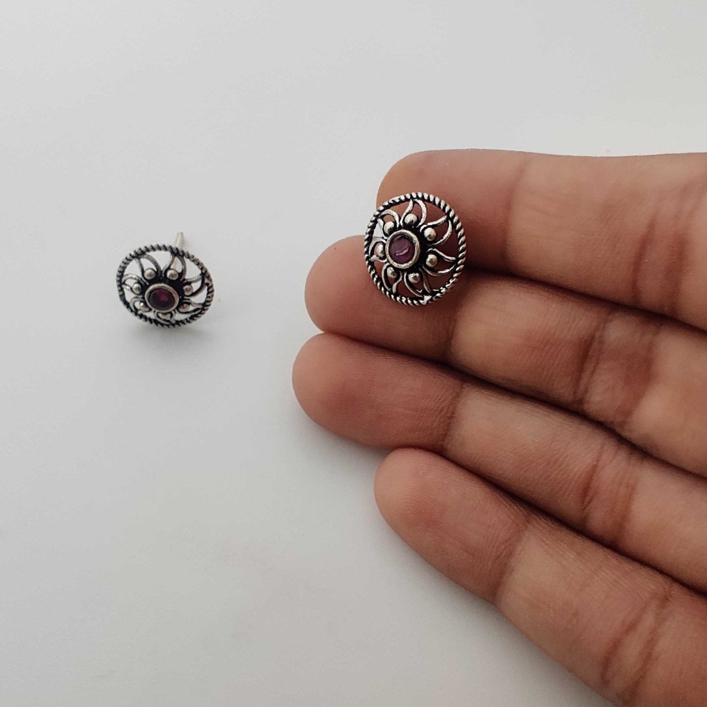 Silver Ruby center FlowerInCircle Stud